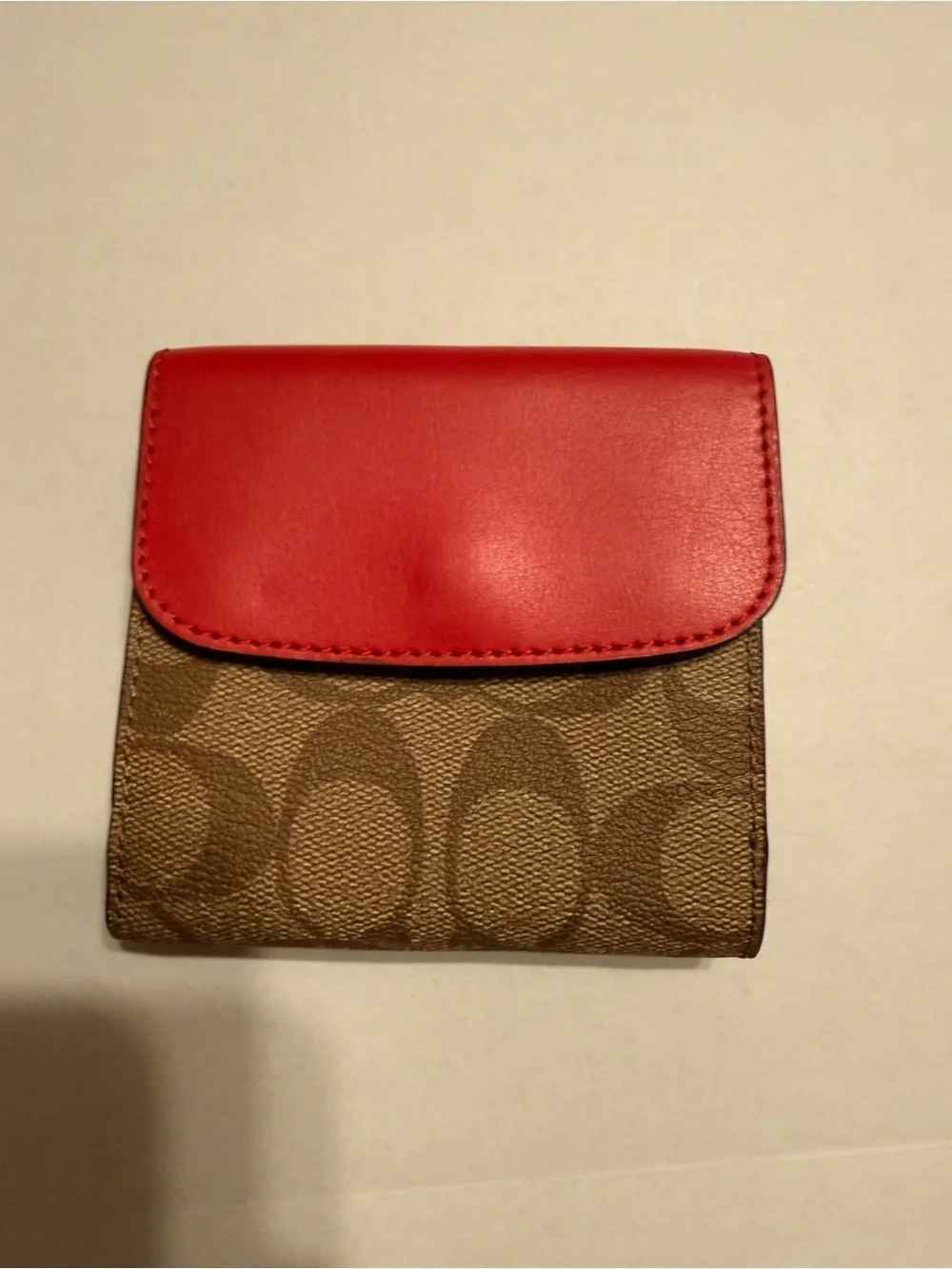 Coach Trifold Wallet in pink and Brown